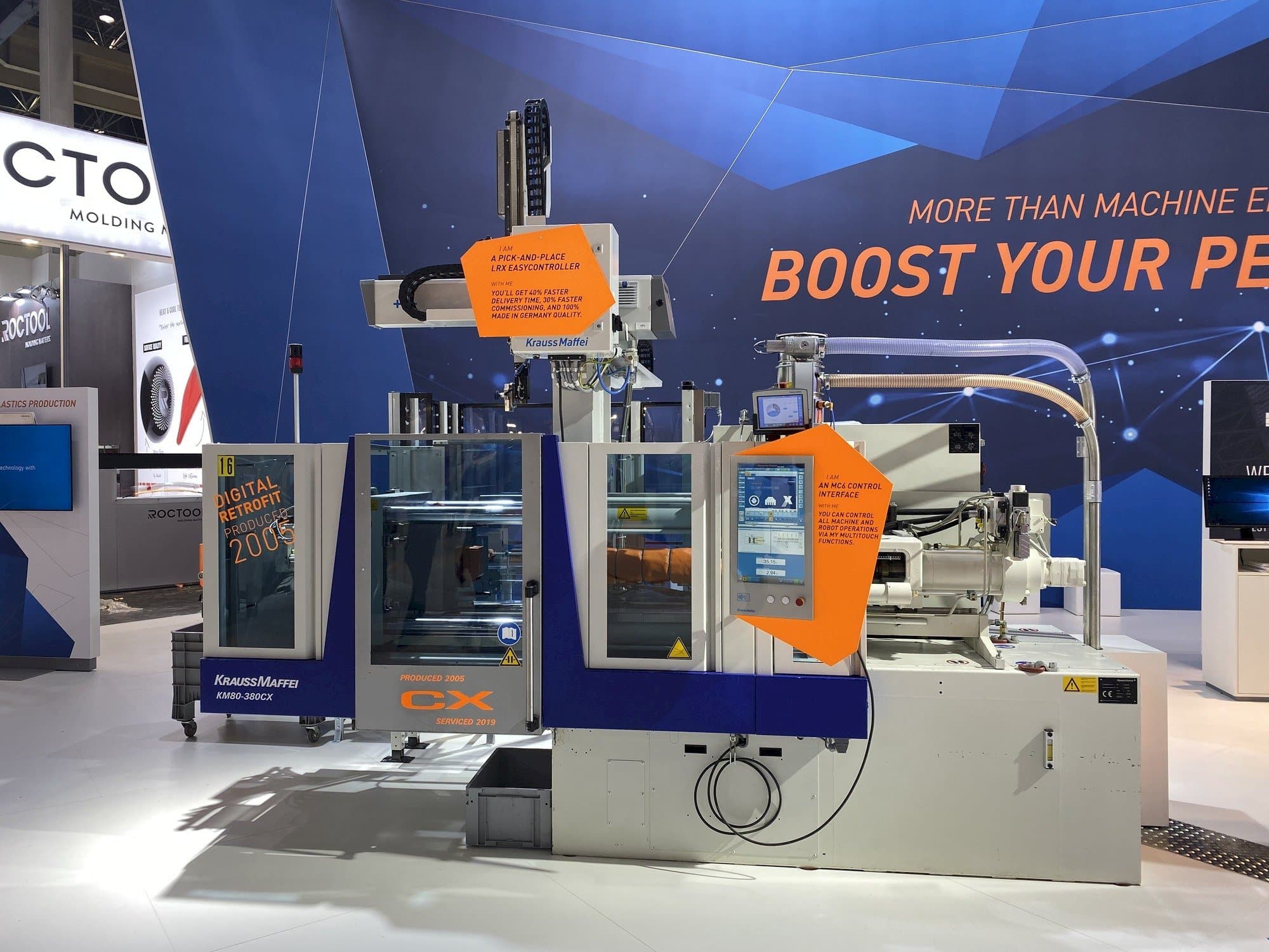 Frontansicht der Krauss Maffei 80-380 CX + LRX easyControl 100 Maschine