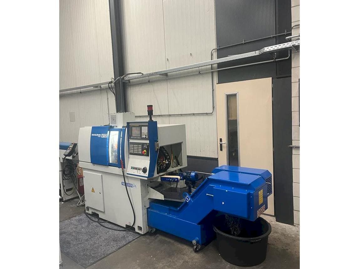 Frontansicht der Manurhin K'MX 413 Maschine