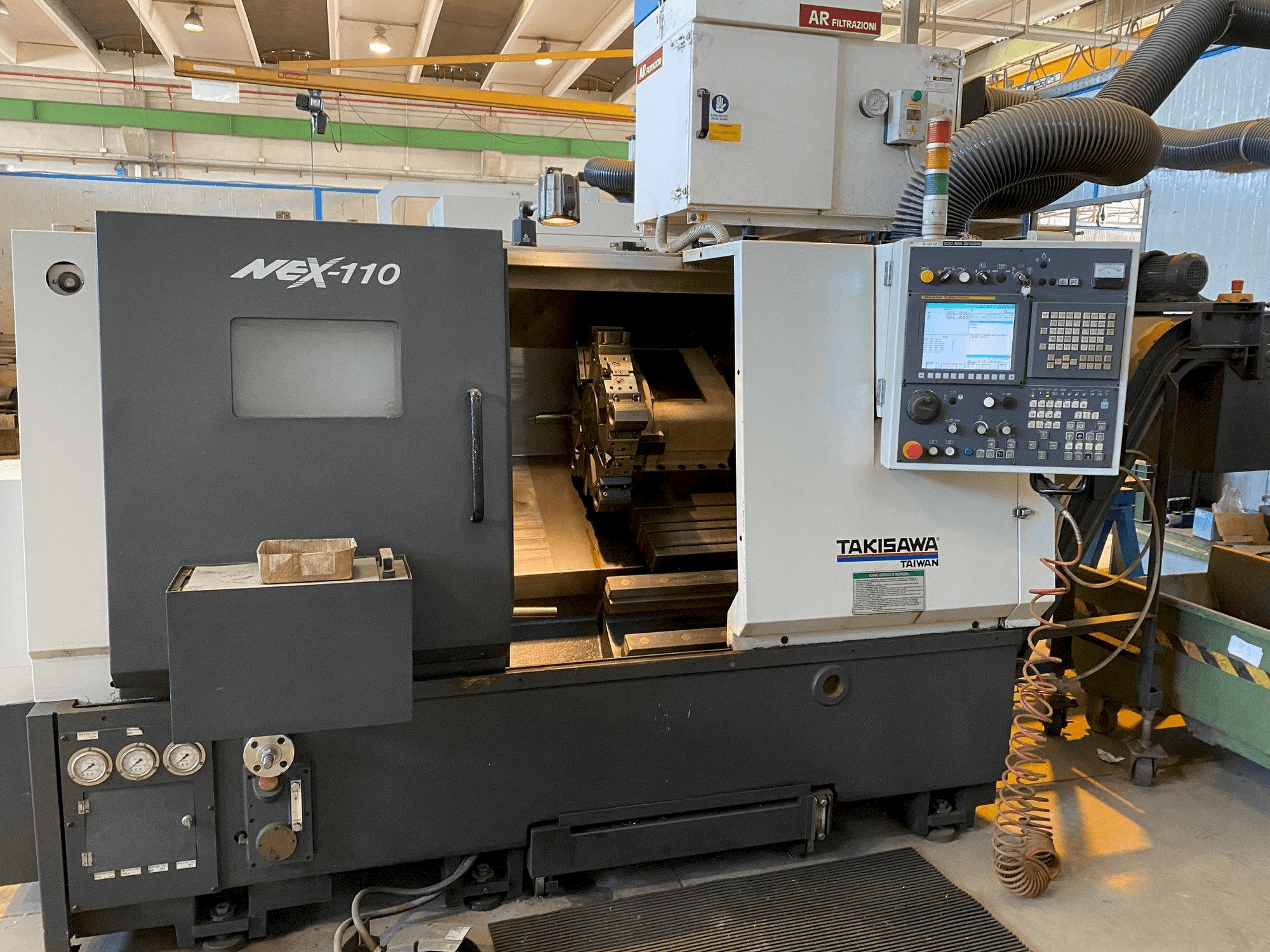 Frontansicht der Takisawa NEX-110 Maschine