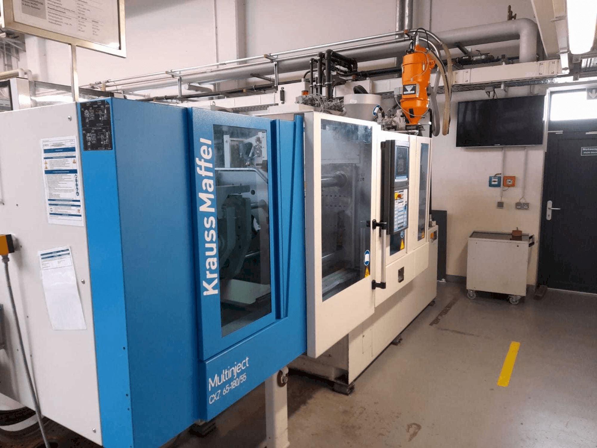 Frontansicht der Krauss Maffei KM 65/80 CX Maschine
