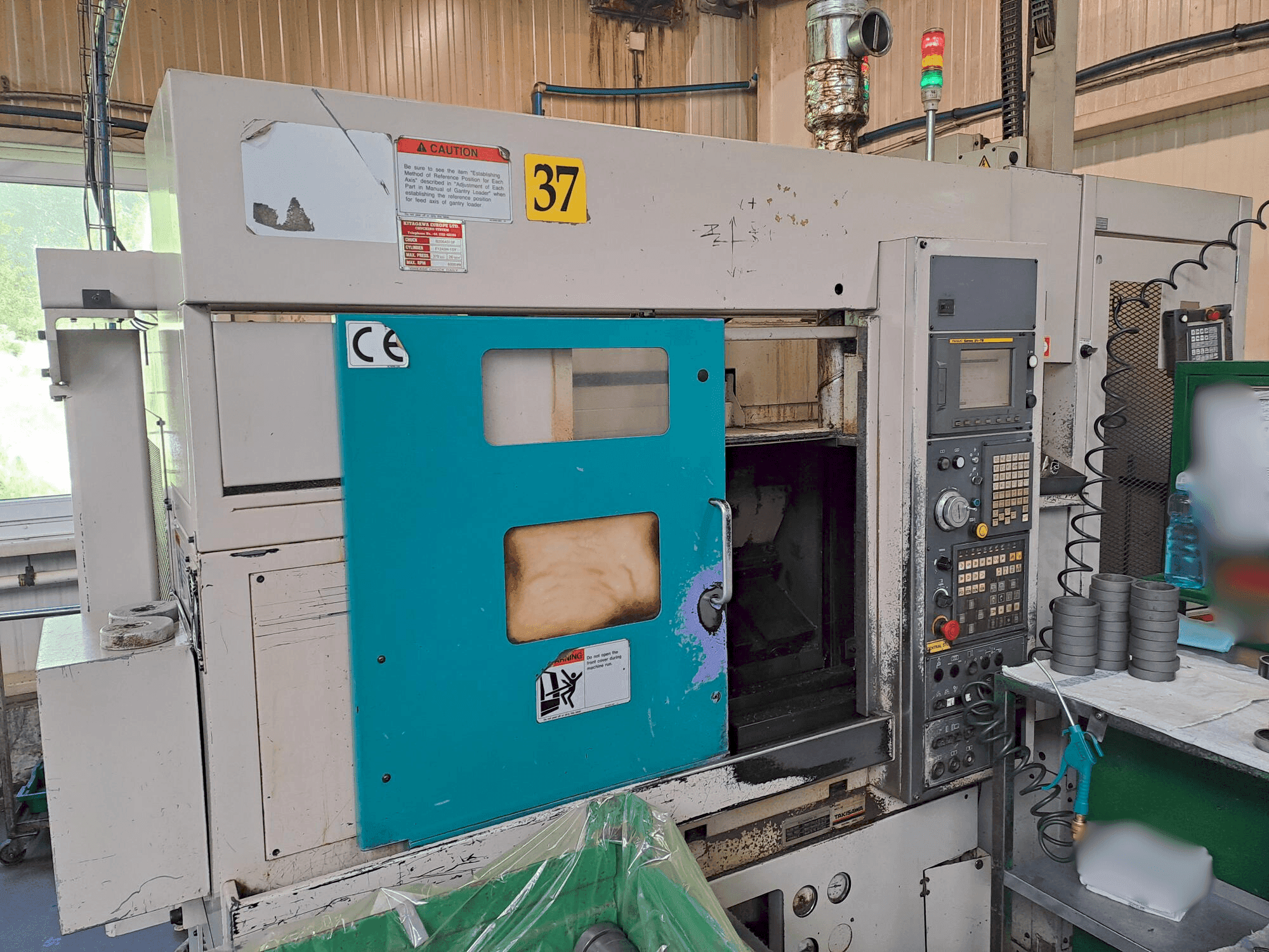 Frontansicht der Takisawa TC 200 Maschine