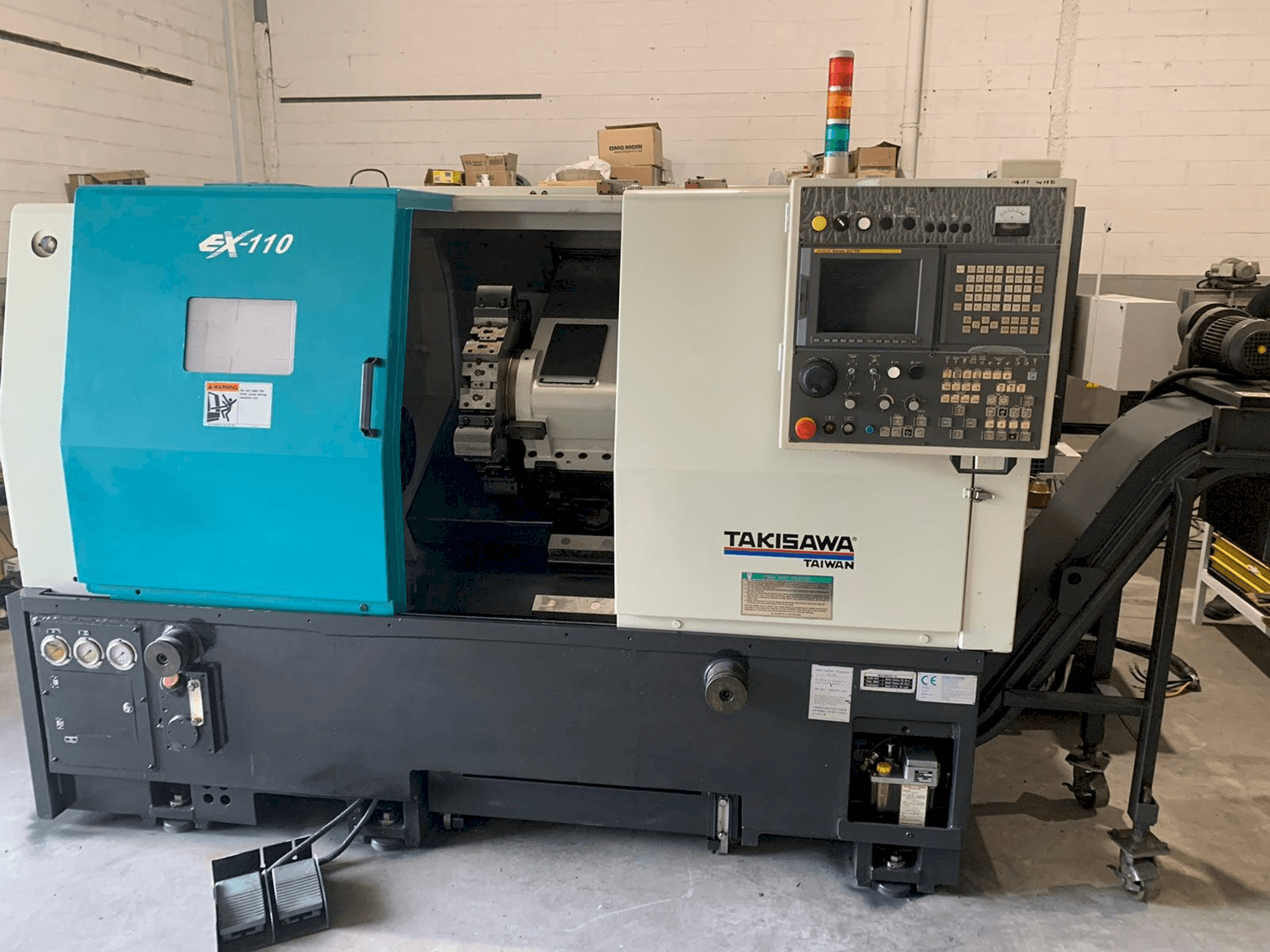 Frontansicht der Takisawa EX-110 Maschine
