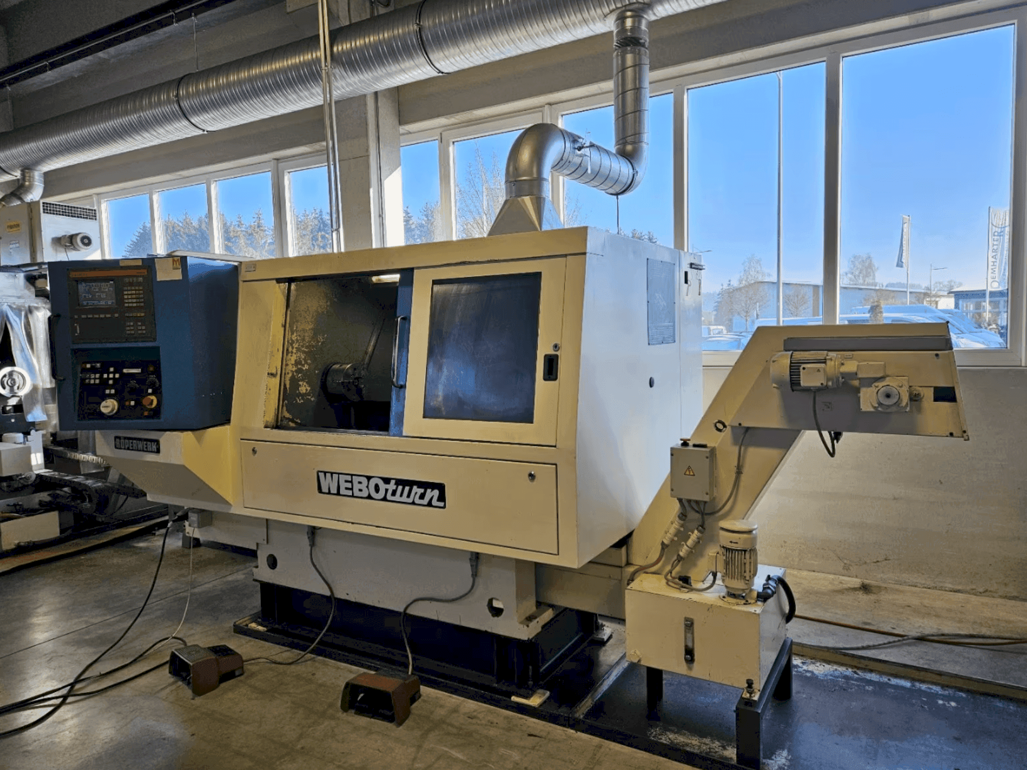 Frontansicht der ROEPERWERK WEBOturn Maschine