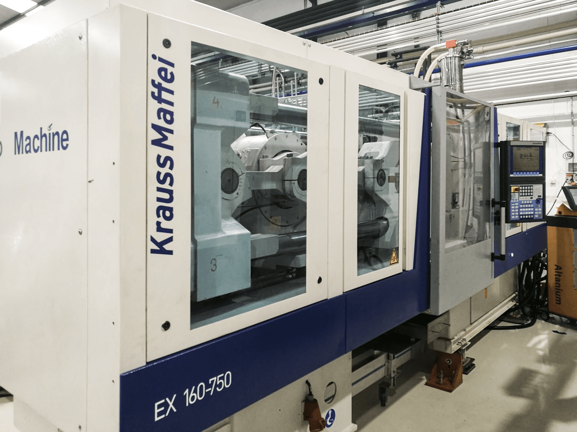 Linke Ansicht der Krauss Maffei 160-750 EX Maschine
