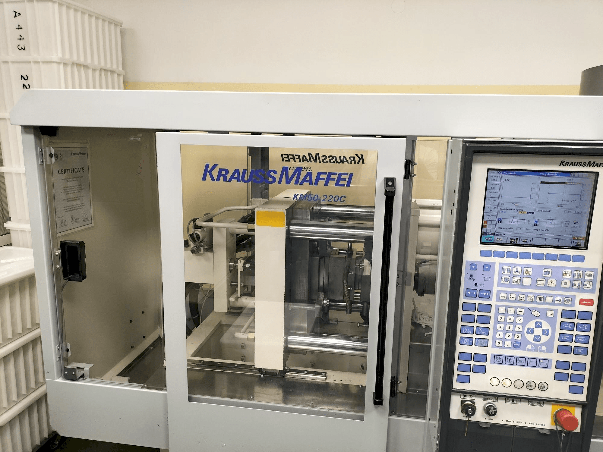 Frontansicht der Krauss Maffei KM 50-220C Win Maschine