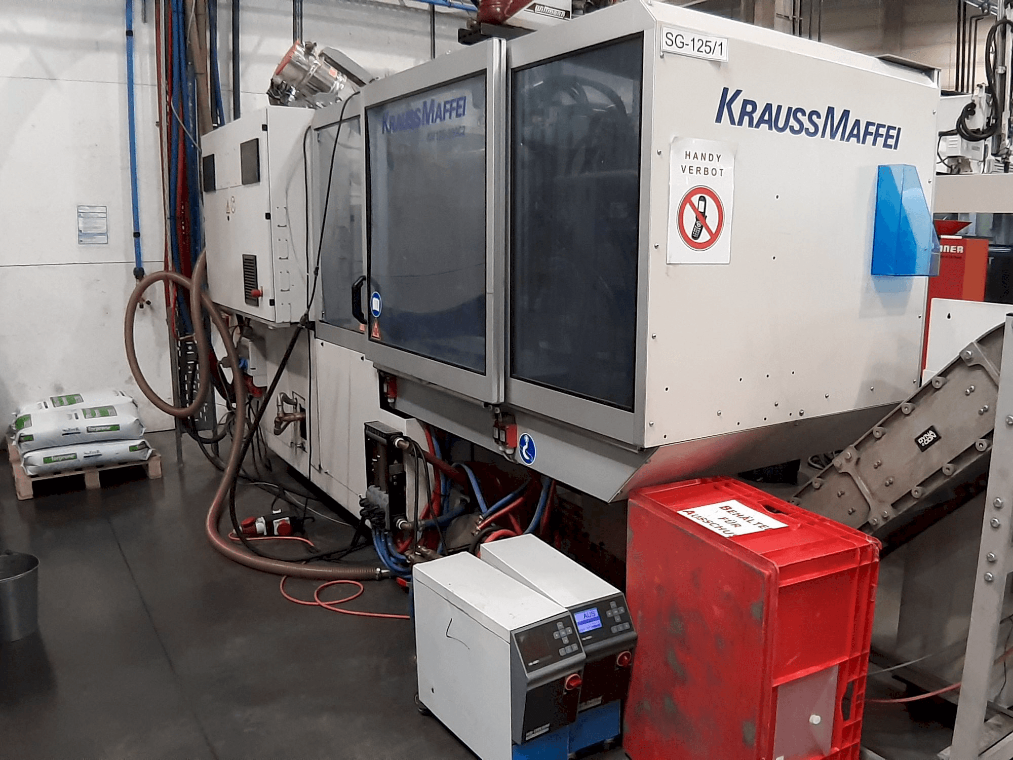 Frontansicht der Krauss Maffei 125 - 390 CX Maschine