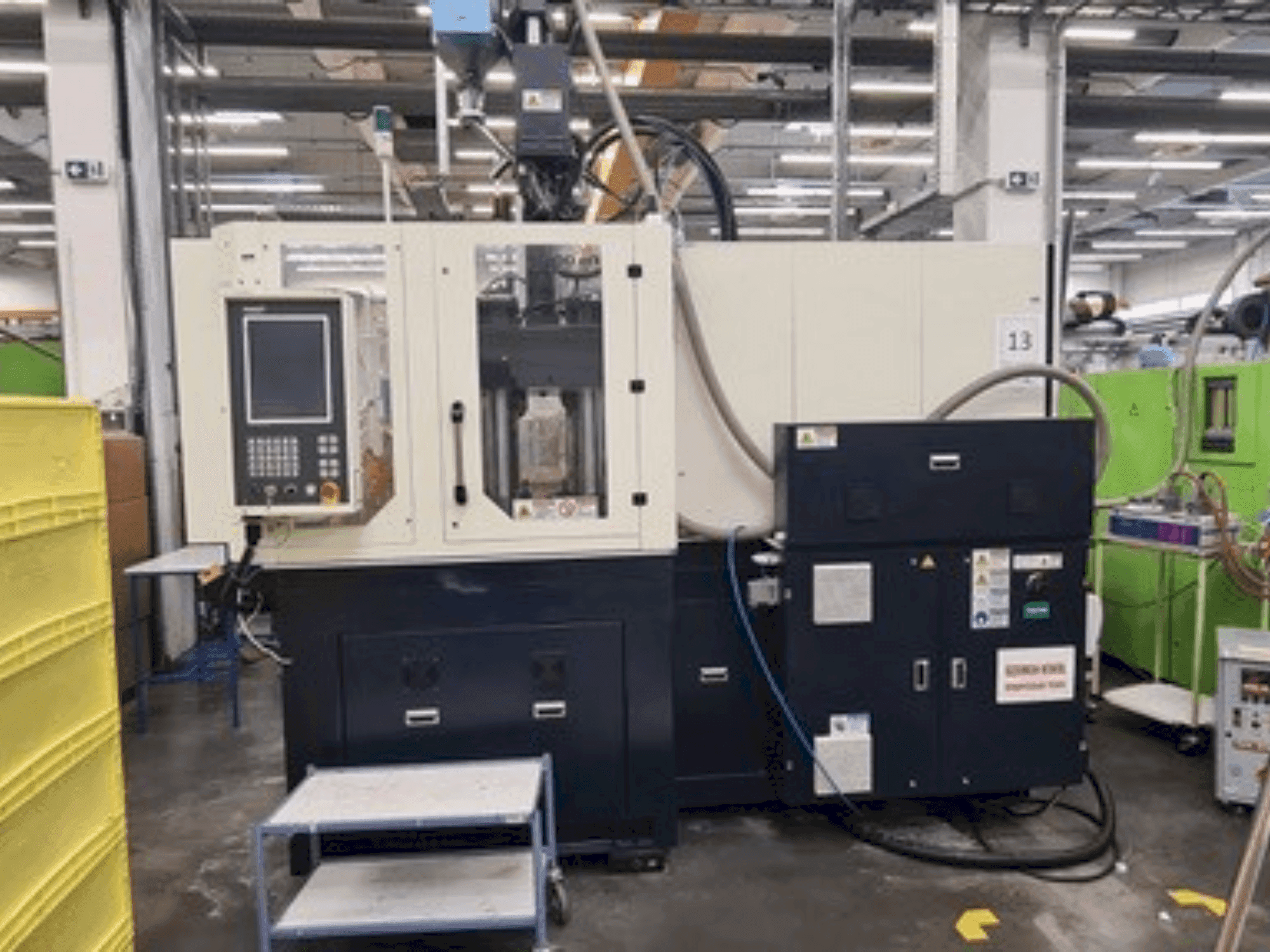 Frontansicht der WOOJIN VHA120RS Maschine