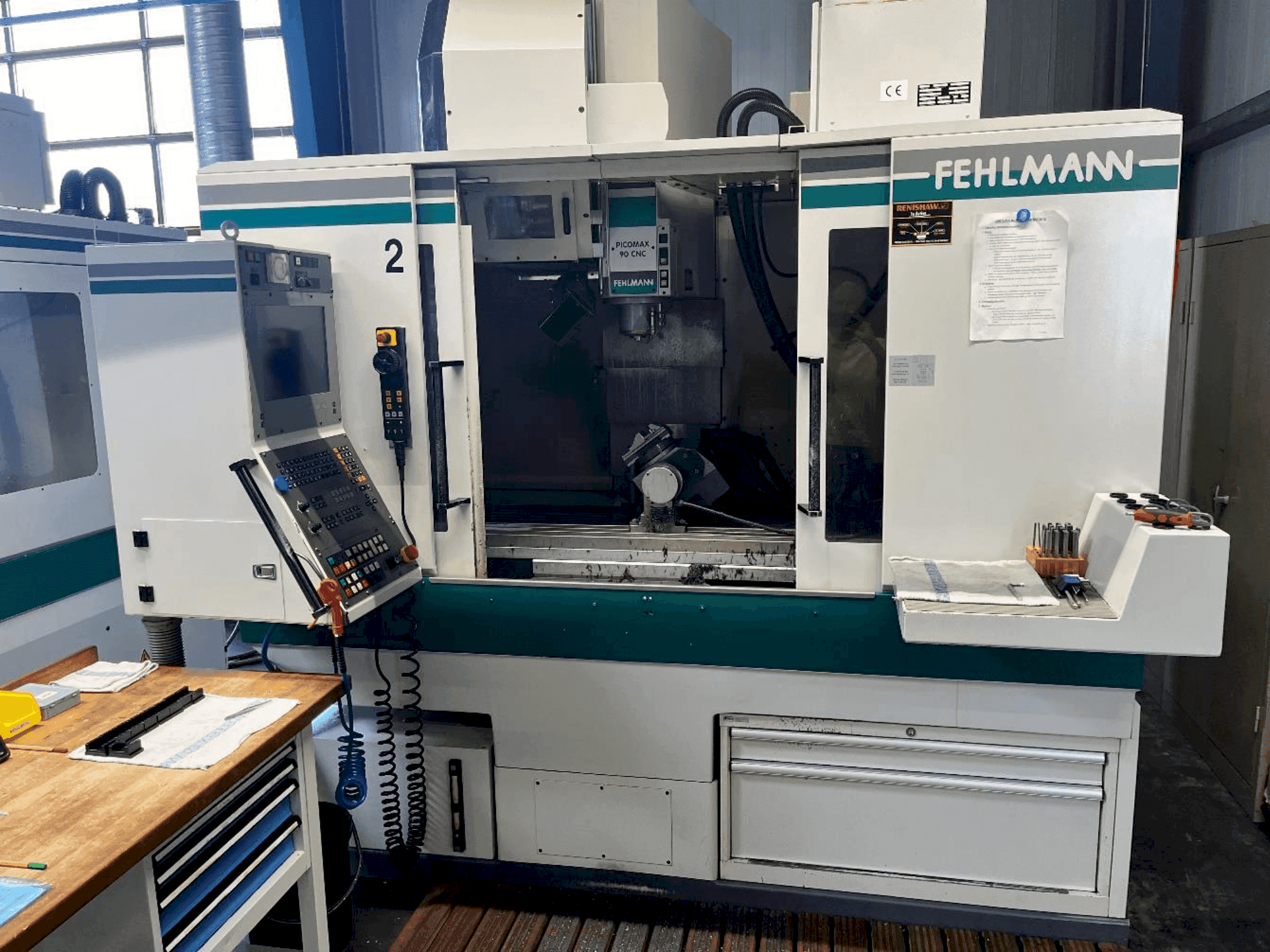 Frontansicht der FEHLMANN Picomax 90 CNC Maschine