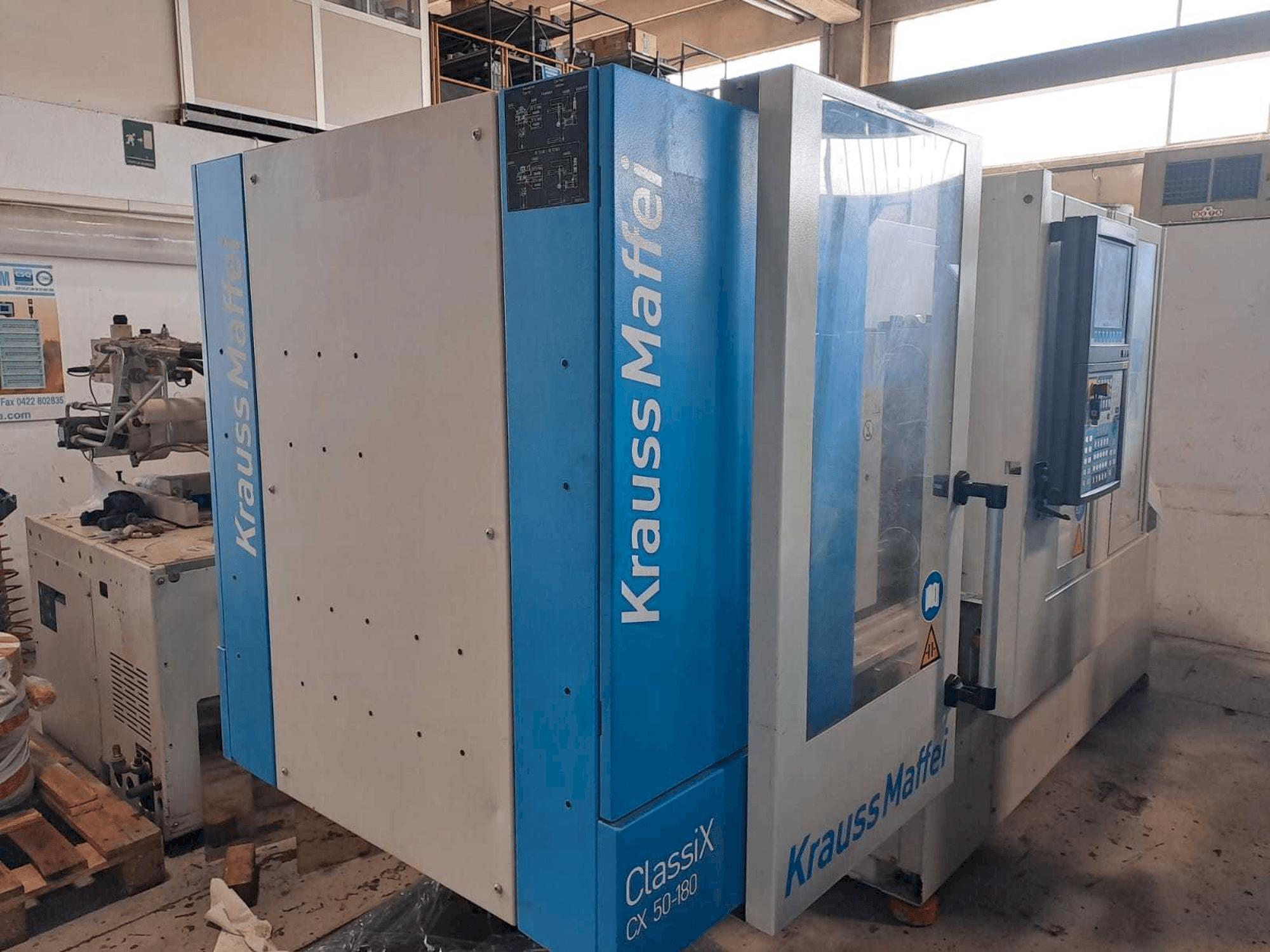 Linke Ansicht der Krauss Maffei 50-180CX Maschine