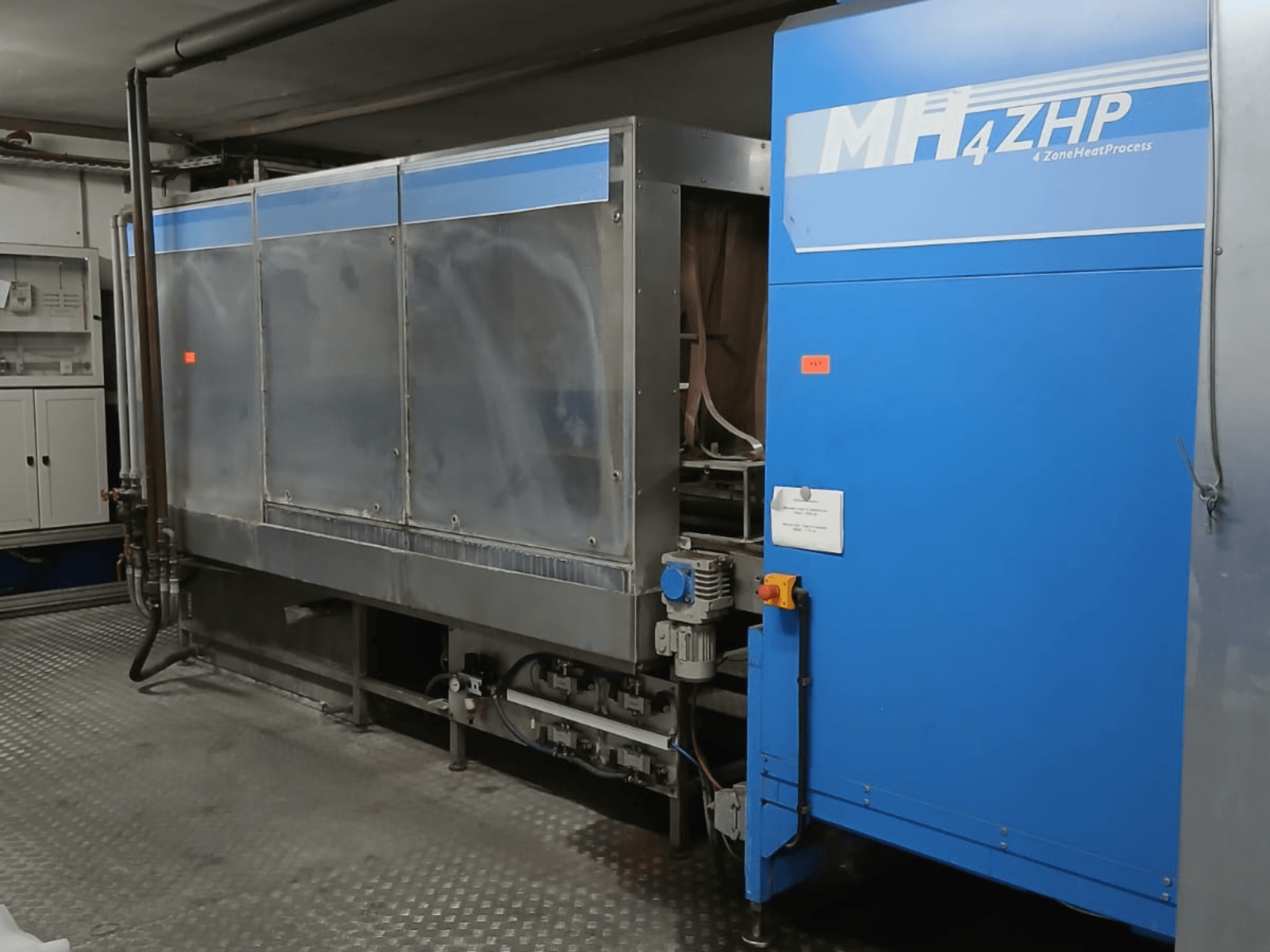 Industriemaschine MH 4ZHP in der Seitenansicht, mit Edelstahlstruktur und blauer Tafel mit Bedienelementen.