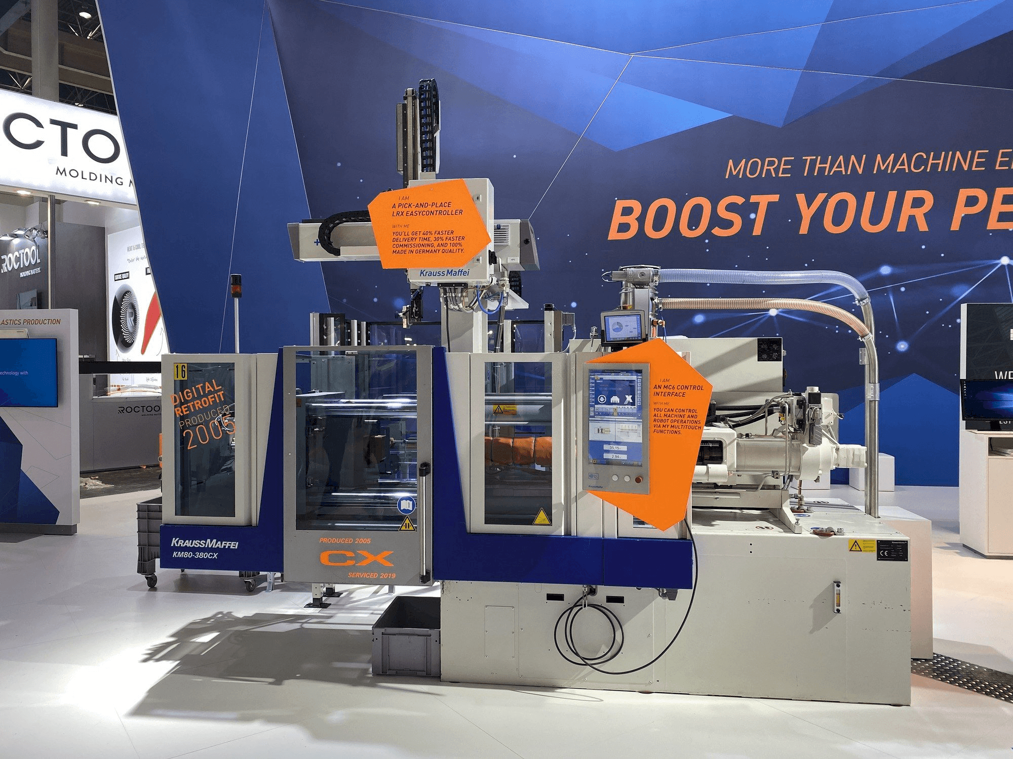 Frontansicht der Krauss Maffei 80-380 CX + LRX easyControl 100 Maschine