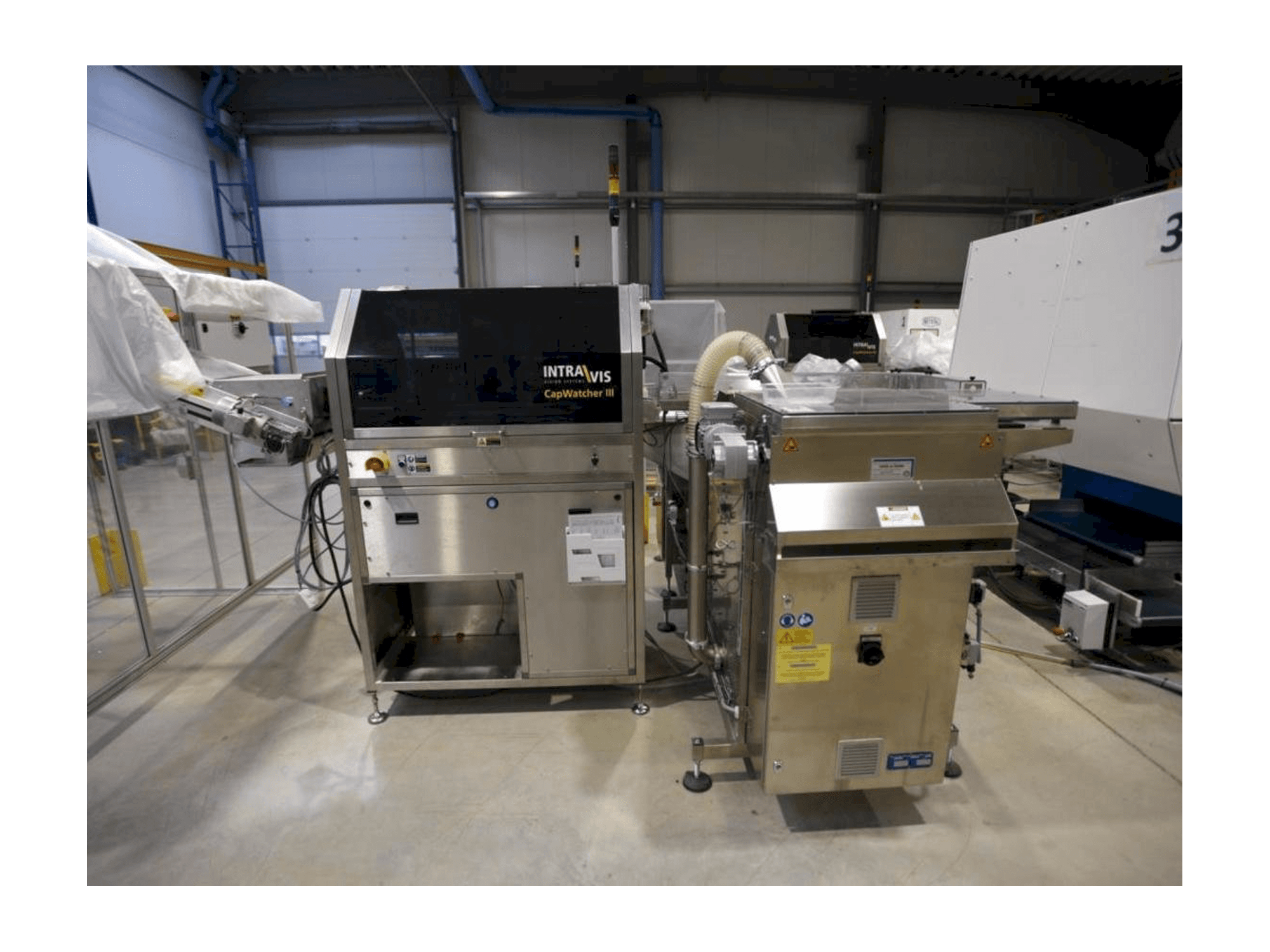 Frontansicht der INTRAVIS Capwatcher 6431 Maschine