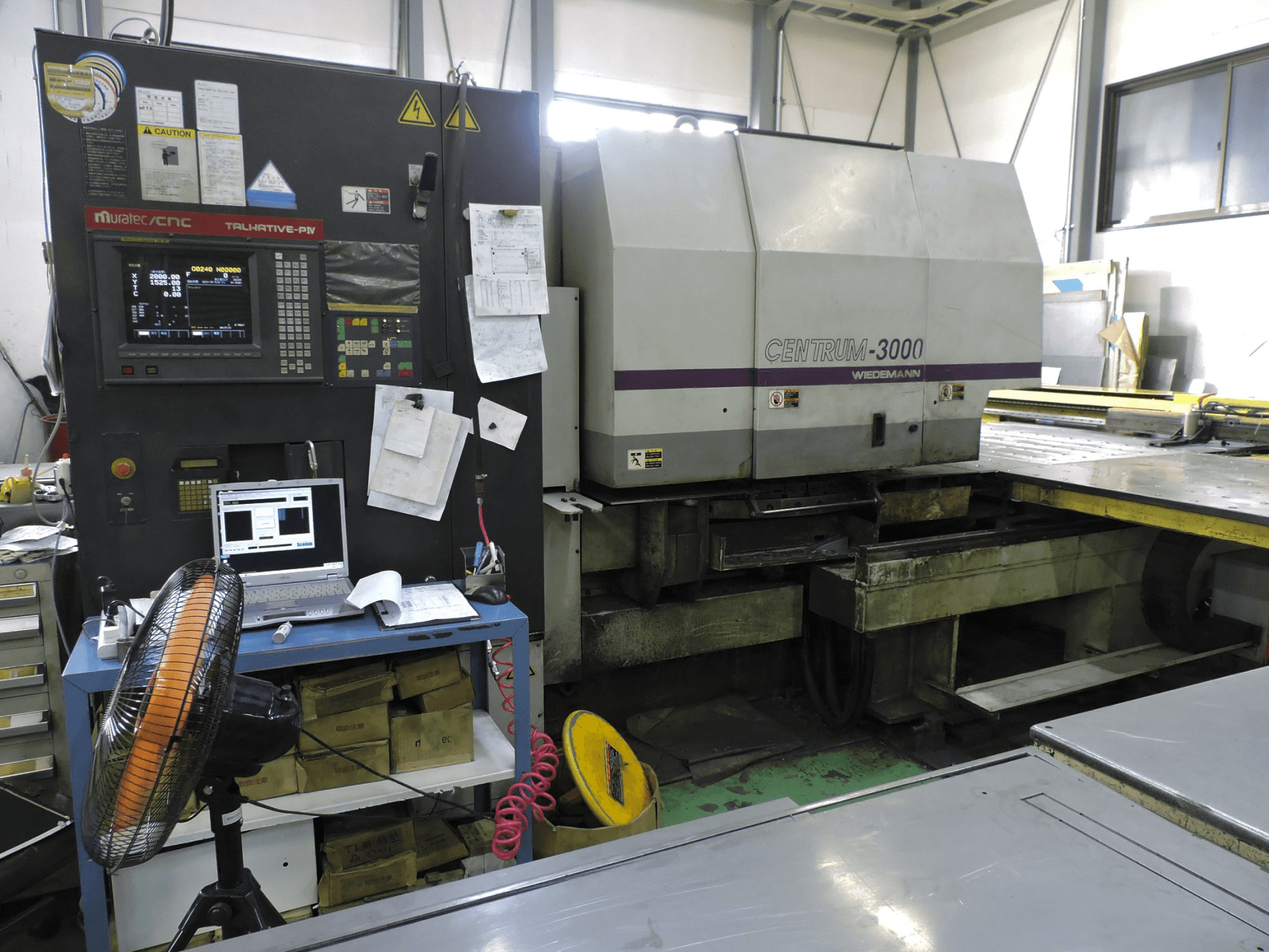 Linke Seitenansicht 1 der Murata Wiedemann C-3000 Maschine